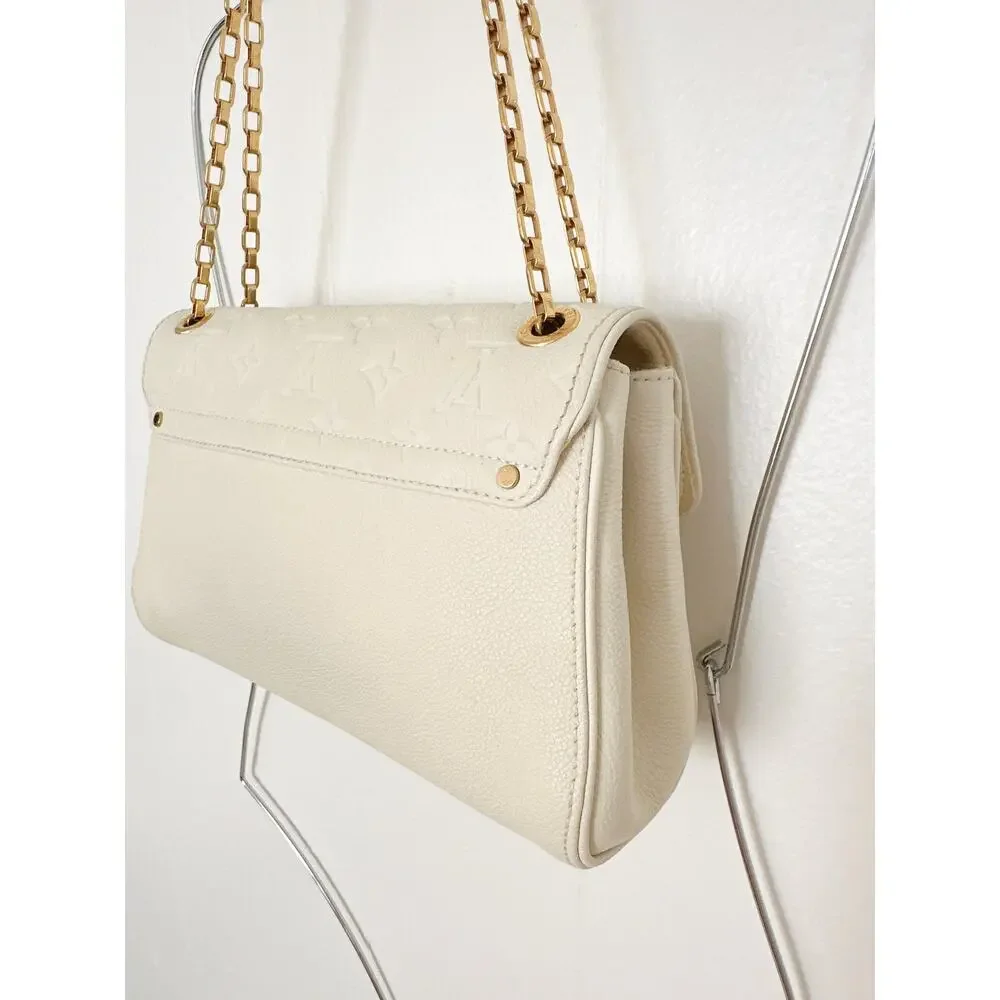 Louis Vuitton Monogram Empreinte Saint Germain PM Chain Flap Bag Dune Cream